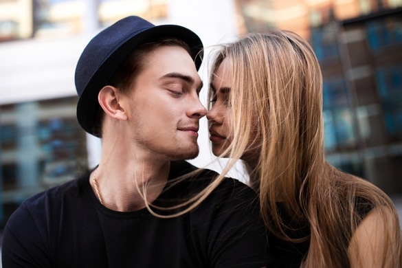 couple-dressed-in-black-looking-at-each-other