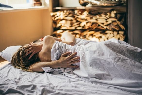 beautiful couple lying together on the bed - Taurus Man In Bed With Libra Woman